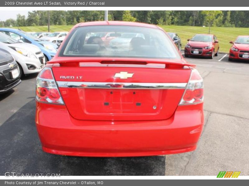 Victory Red / Charcoal 2009 Chevrolet Aveo LT Sedan
