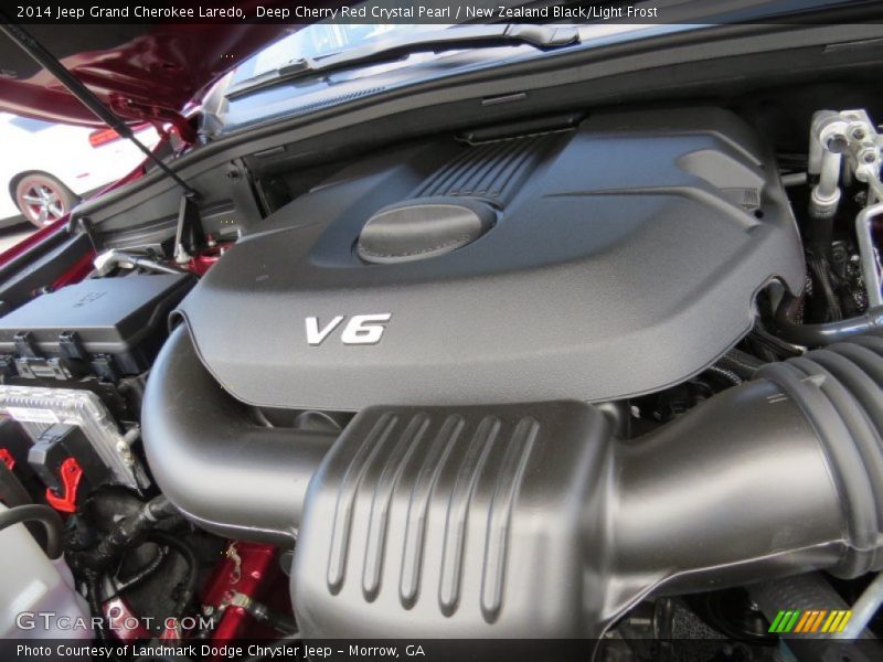 Deep Cherry Red Crystal Pearl / New Zealand Black/Light Frost 2014 Jeep Grand Cherokee Laredo