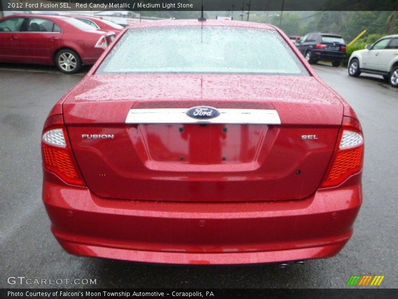 Red Candy Metallic / Medium Light Stone 2012 Ford Fusion SEL