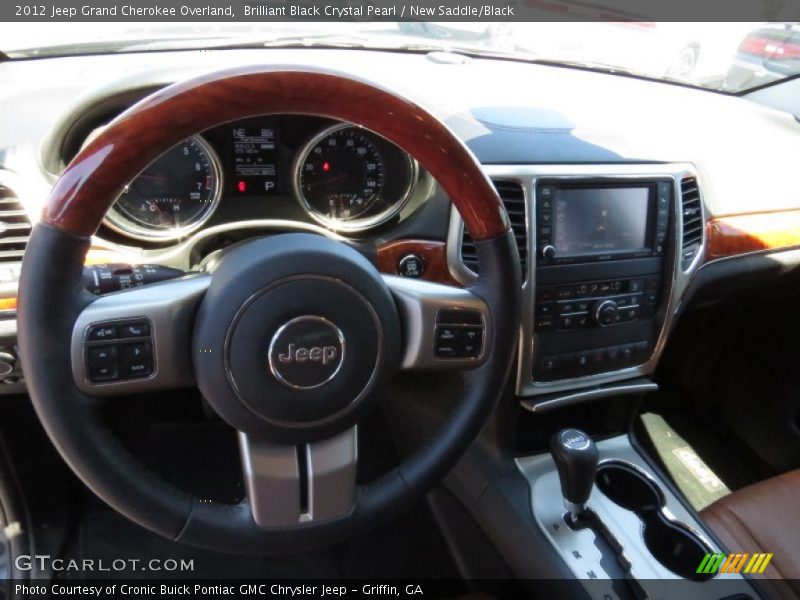 Brilliant Black Crystal Pearl / New Saddle/Black 2012 Jeep Grand Cherokee Overland