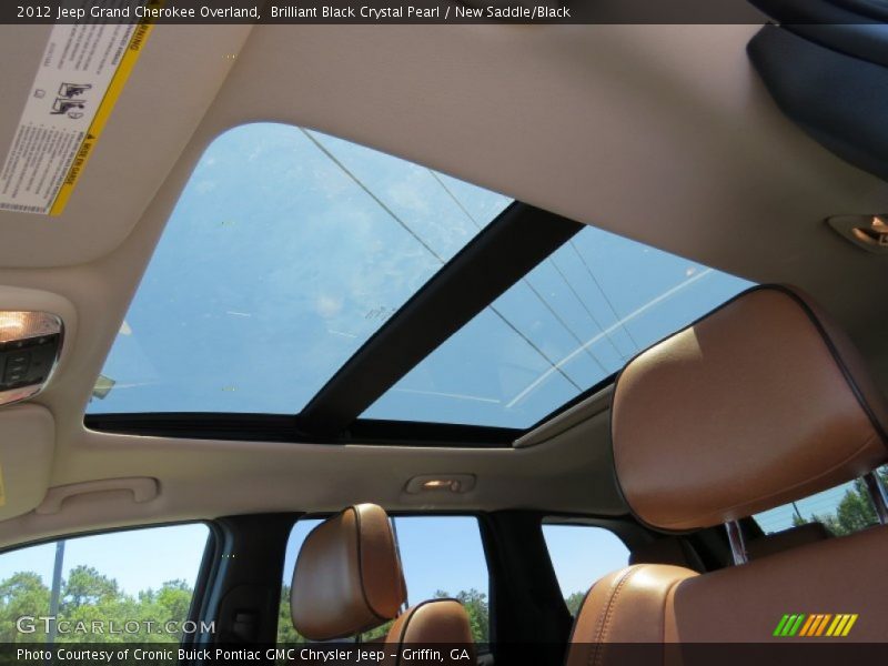 Brilliant Black Crystal Pearl / New Saddle/Black 2012 Jeep Grand Cherokee Overland