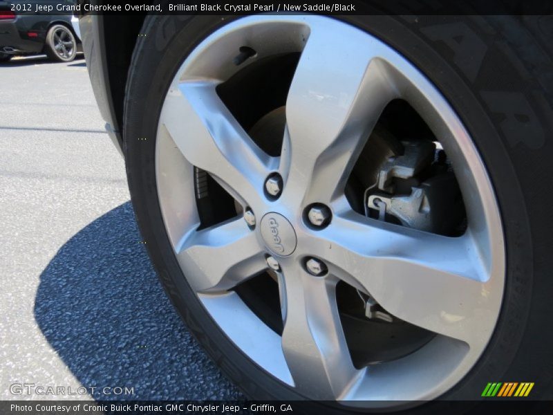 Brilliant Black Crystal Pearl / New Saddle/Black 2012 Jeep Grand Cherokee Overland