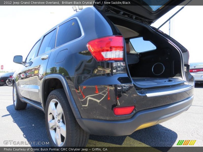 Brilliant Black Crystal Pearl / New Saddle/Black 2012 Jeep Grand Cherokee Overland