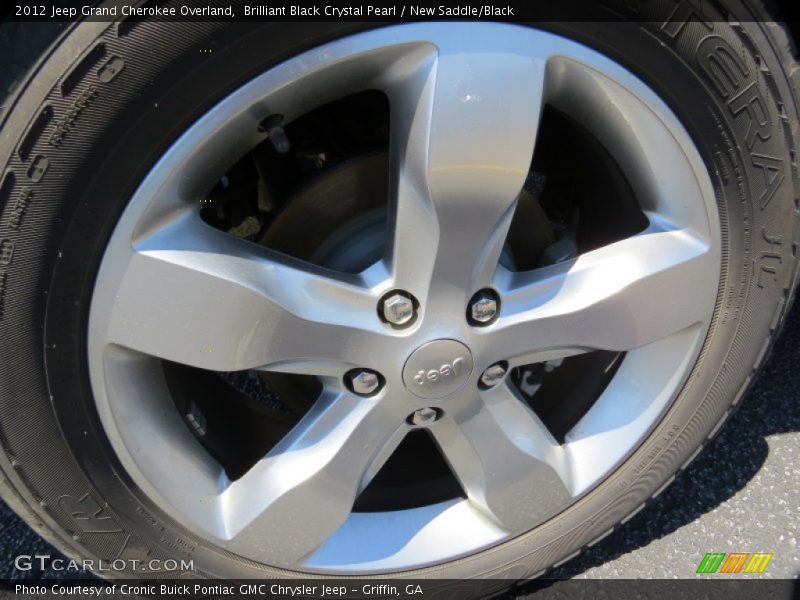 Brilliant Black Crystal Pearl / New Saddle/Black 2012 Jeep Grand Cherokee Overland