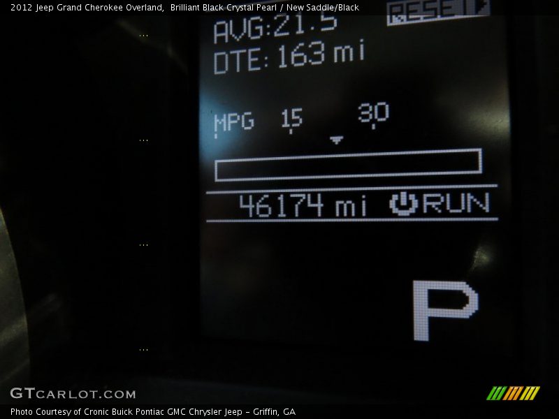 Brilliant Black Crystal Pearl / New Saddle/Black 2012 Jeep Grand Cherokee Overland