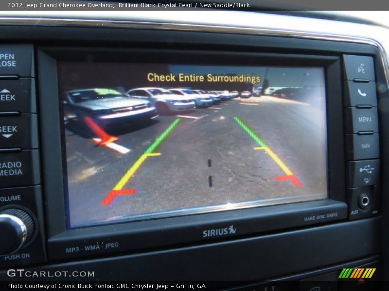 Brilliant Black Crystal Pearl / New Saddle/Black 2012 Jeep Grand Cherokee Overland