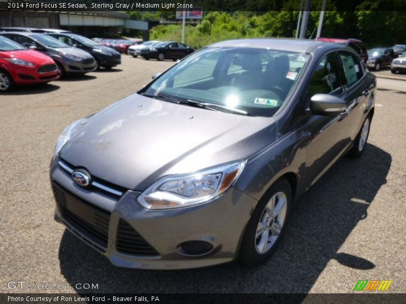 Sterling Gray / Medium Light Stone 2014 Ford Focus SE Sedan
