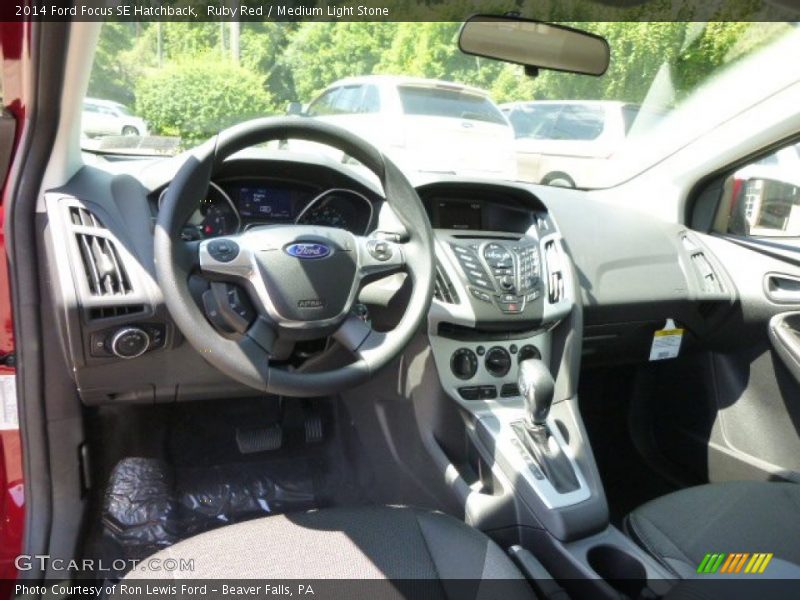 Ruby Red / Medium Light Stone 2014 Ford Focus SE Hatchback