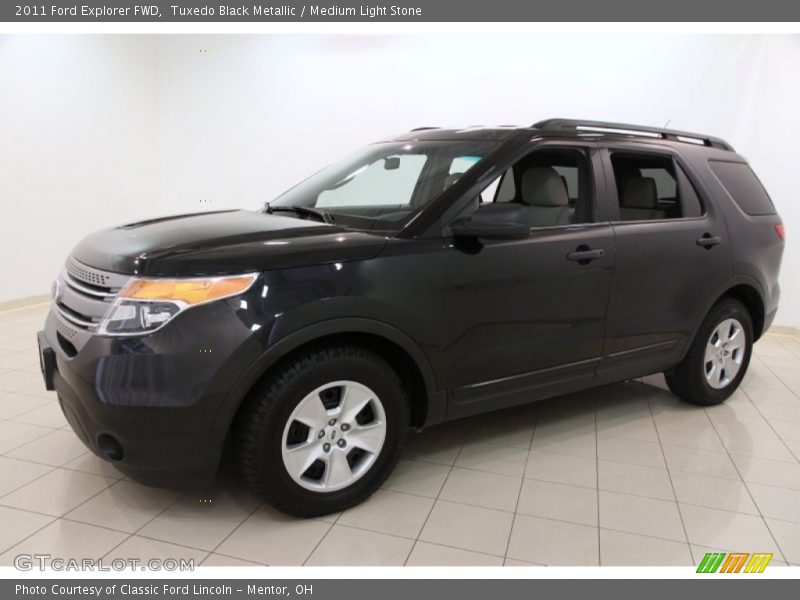 Tuxedo Black Metallic / Medium Light Stone 2011 Ford Explorer FWD