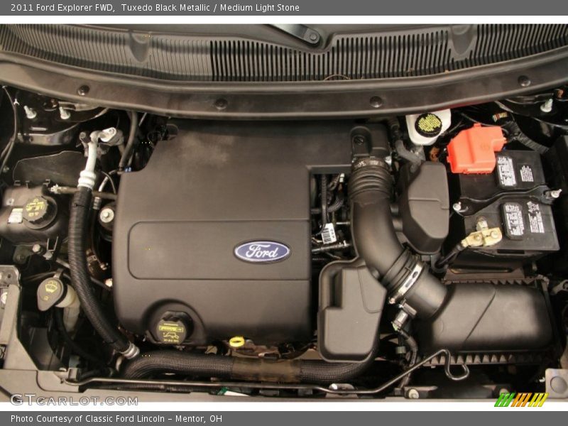 Tuxedo Black Metallic / Medium Light Stone 2011 Ford Explorer FWD