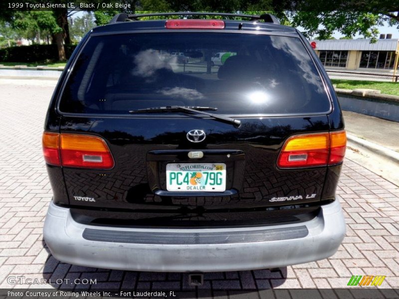 Black / Oak Beige 1999 Toyota Sienna LE