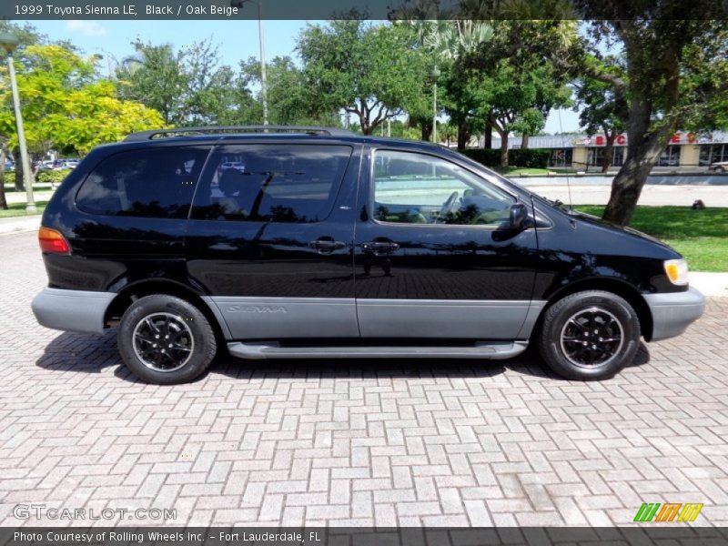Black / Oak Beige 1999 Toyota Sienna LE