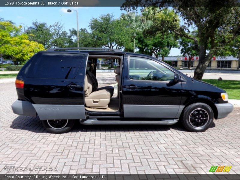 Black / Oak Beige 1999 Toyota Sienna LE