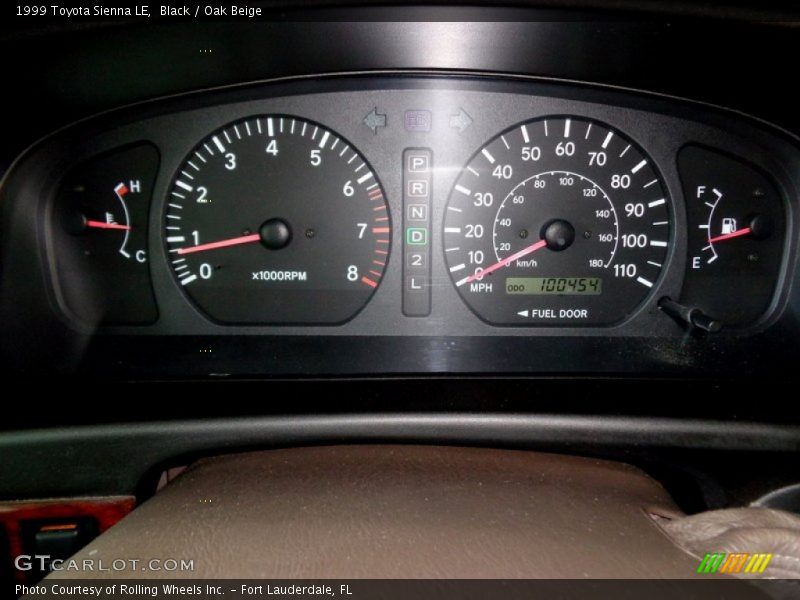 Black / Oak Beige 1999 Toyota Sienna LE