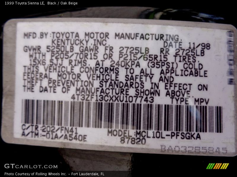 Black / Oak Beige 1999 Toyota Sienna LE