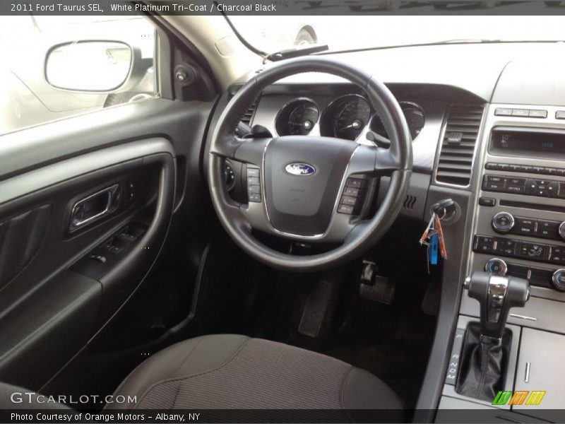 White Platinum Tri-Coat / Charcoal Black 2011 Ford Taurus SEL