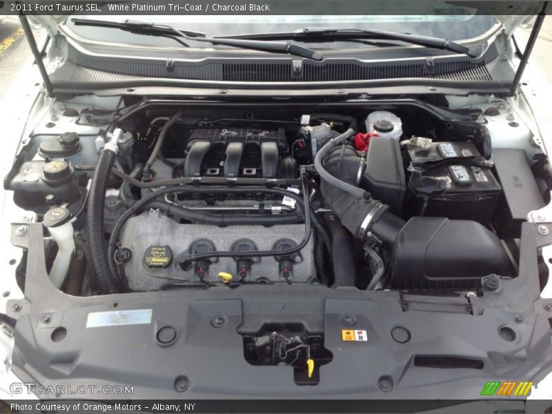 White Platinum Tri-Coat / Charcoal Black 2011 Ford Taurus SEL