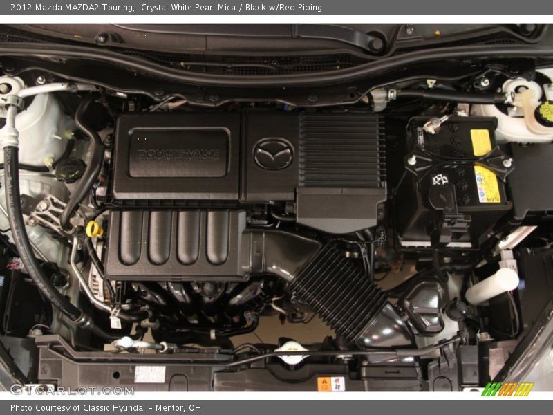 Crystal White Pearl Mica / Black w/Red Piping 2012 Mazda MAZDA2 Touring