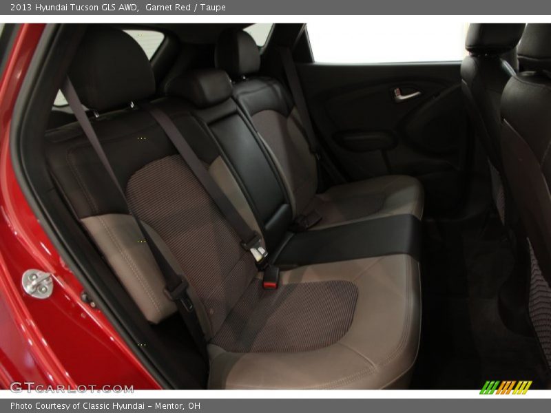 Garnet Red / Taupe 2013 Hyundai Tucson GLS AWD