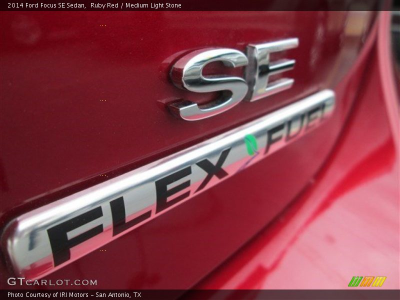 Ruby Red / Medium Light Stone 2014 Ford Focus SE Sedan