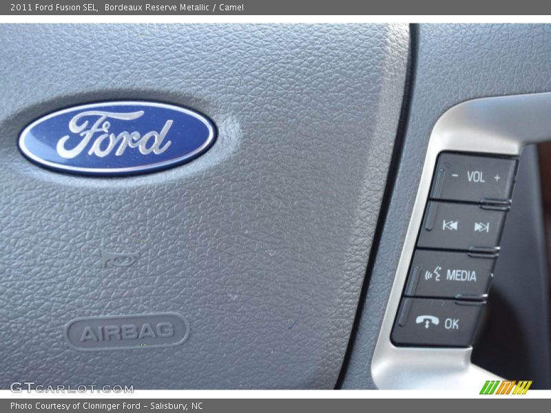 Bordeaux Reserve Metallic / Camel 2011 Ford Fusion SEL