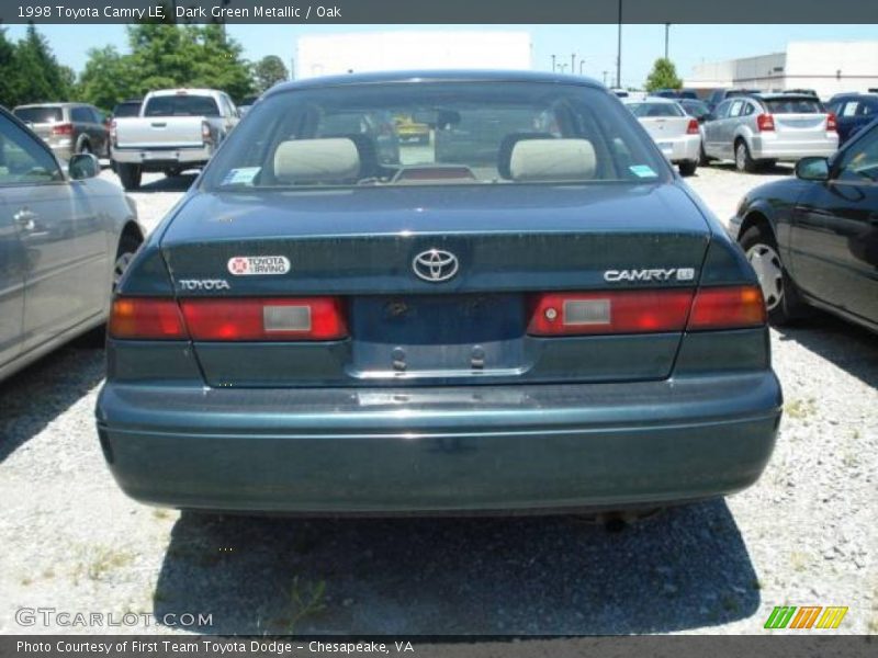 Dark Green Metallic / Oak 1998 Toyota Camry LE