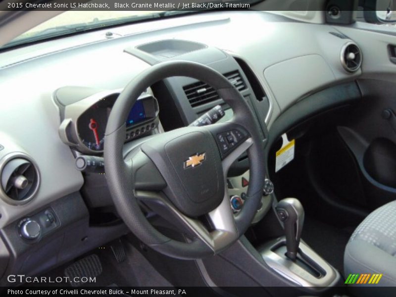 Dashboard of 2015 Sonic LS Hatchback