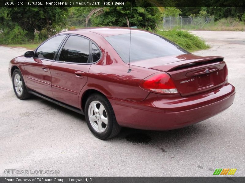 Merlot Metallic / Medium/Dark Pebble Beige 2006 Ford Taurus SE