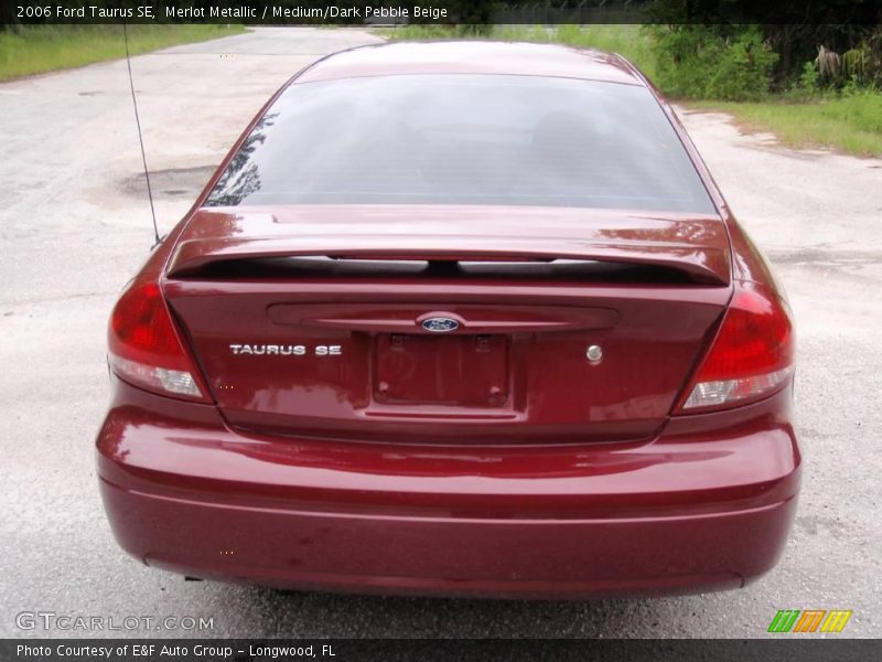 Merlot Metallic / Medium/Dark Pebble Beige 2006 Ford Taurus SE