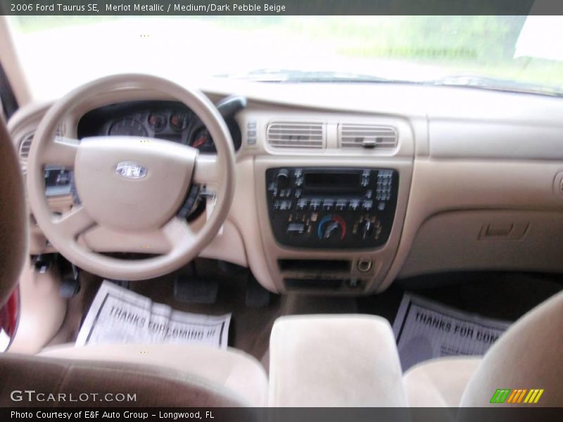 Merlot Metallic / Medium/Dark Pebble Beige 2006 Ford Taurus SE
