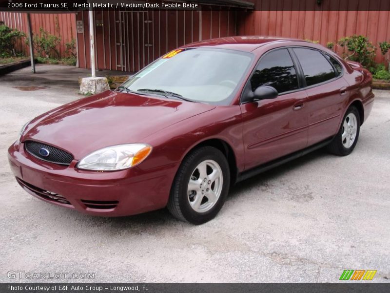 Merlot Metallic / Medium/Dark Pebble Beige 2006 Ford Taurus SE