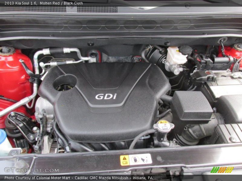 Molten Red / Black Cloth 2013 Kia Soul 1.6