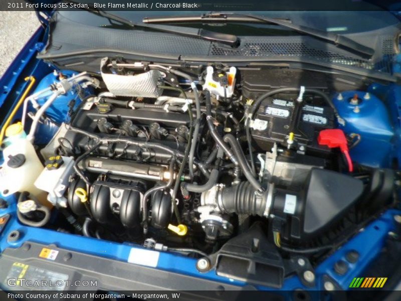 Blue Flame Metallic / Charcoal Black 2011 Ford Focus SES Sedan
