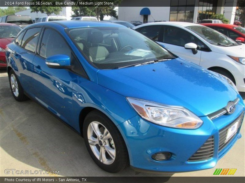 Blue Candy / Medium Light Stone 2014 Ford Focus SE Sedan