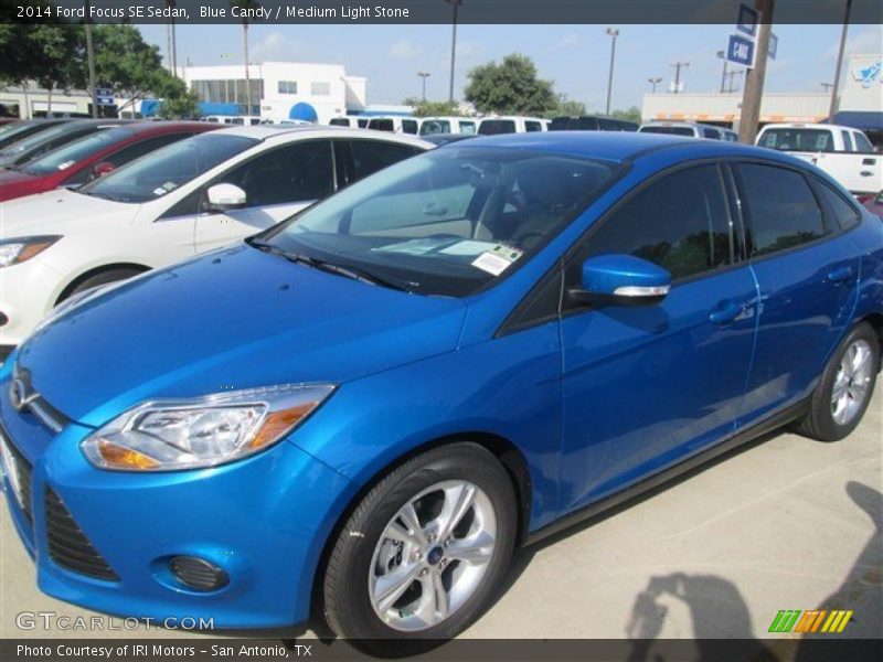 Blue Candy / Medium Light Stone 2014 Ford Focus SE Sedan