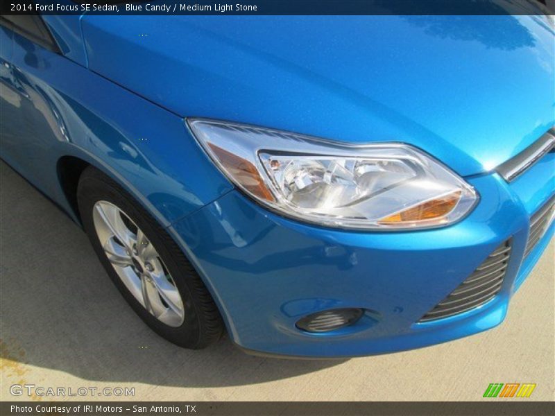 Blue Candy / Medium Light Stone 2014 Ford Focus SE Sedan