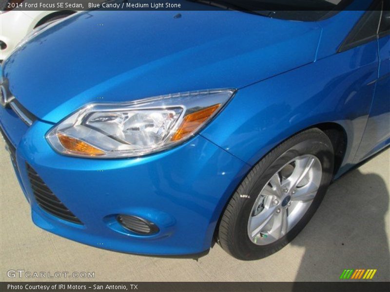 Blue Candy / Medium Light Stone 2014 Ford Focus SE Sedan