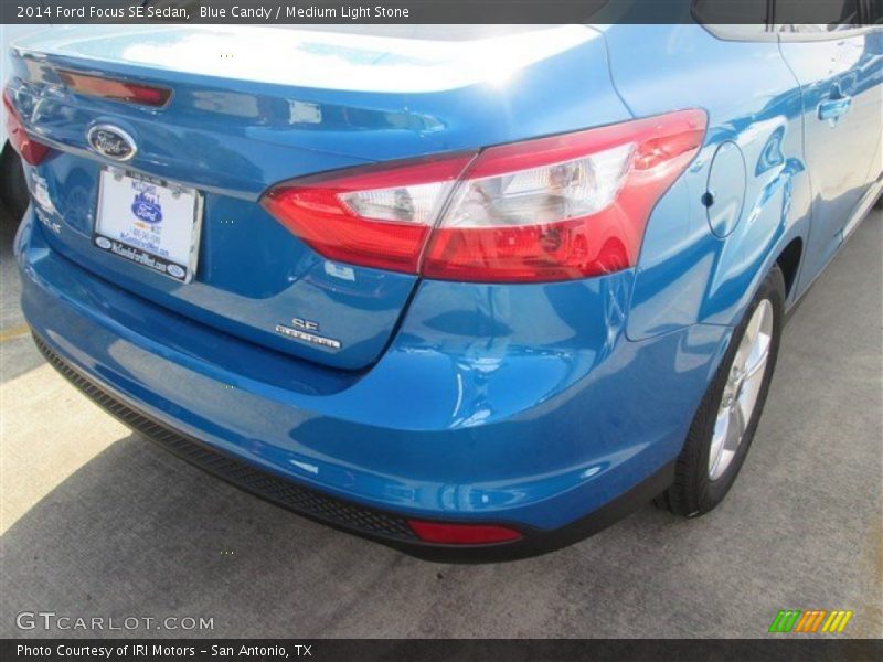 Blue Candy / Medium Light Stone 2014 Ford Focus SE Sedan