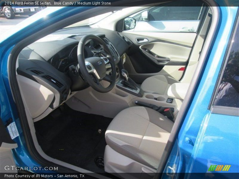 Blue Candy / Medium Light Stone 2014 Ford Focus SE Sedan