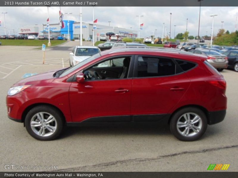 Garnet Red / Taupe 2013 Hyundai Tucson GLS AWD