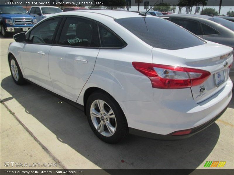 Oxford White / Charcoal Black 2014 Ford Focus SE Sedan