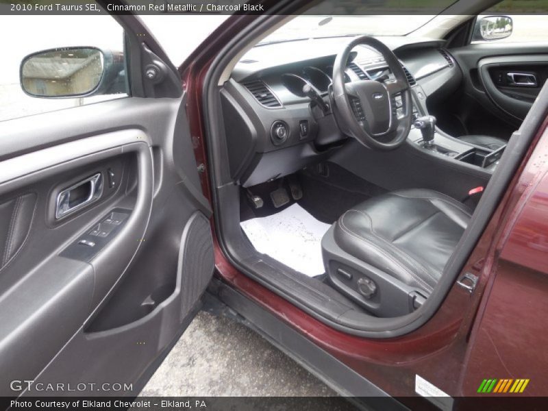 Cinnamon Red Metallic / Charcoal Black 2010 Ford Taurus SEL