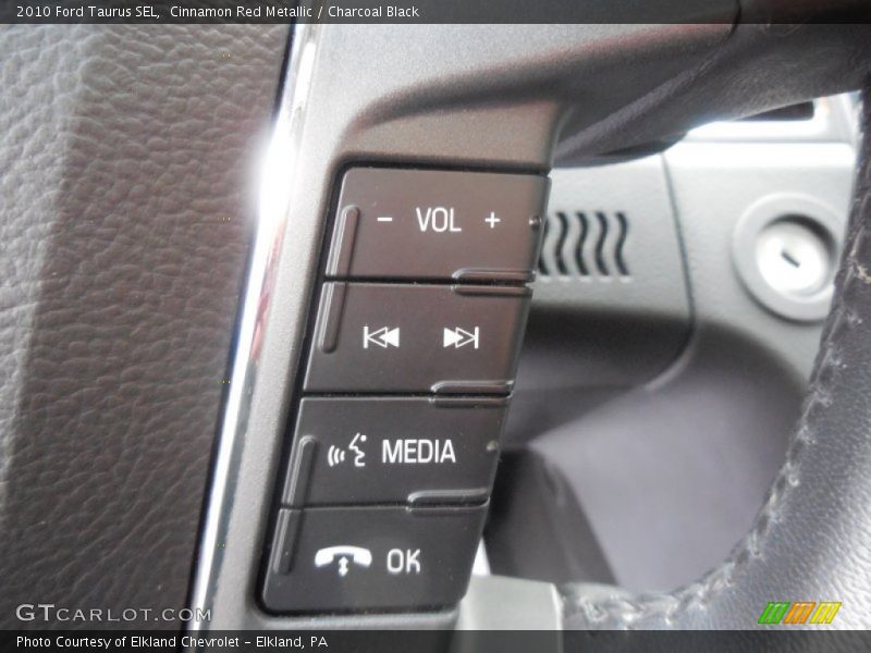 Cinnamon Red Metallic / Charcoal Black 2010 Ford Taurus SEL