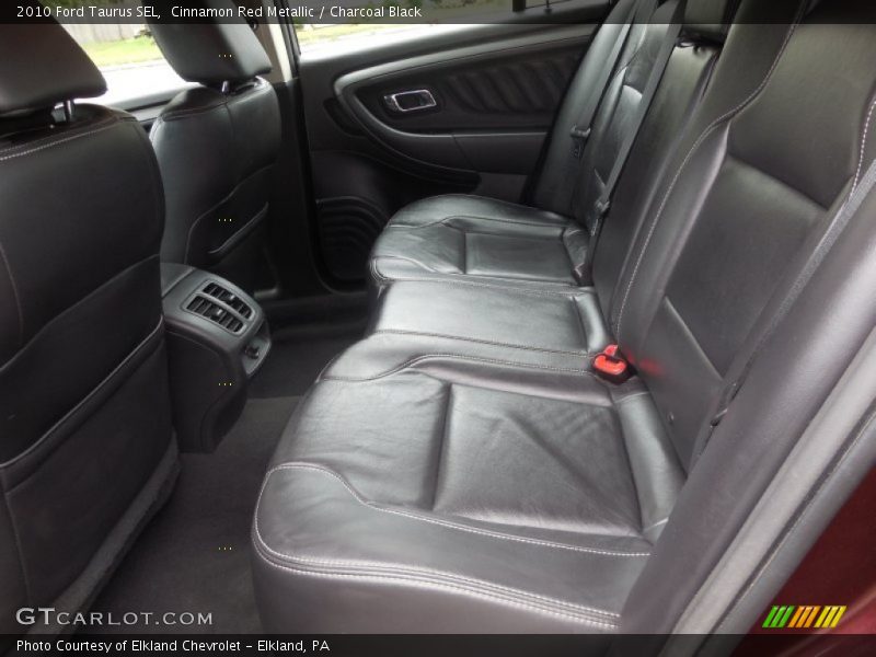 Cinnamon Red Metallic / Charcoal Black 2010 Ford Taurus SEL