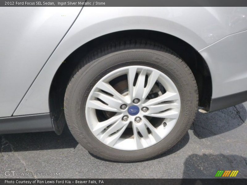 Ingot Silver Metallic / Stone 2012 Ford Focus SEL Sedan