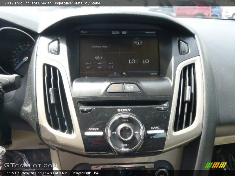 Ingot Silver Metallic / Stone 2012 Ford Focus SEL Sedan