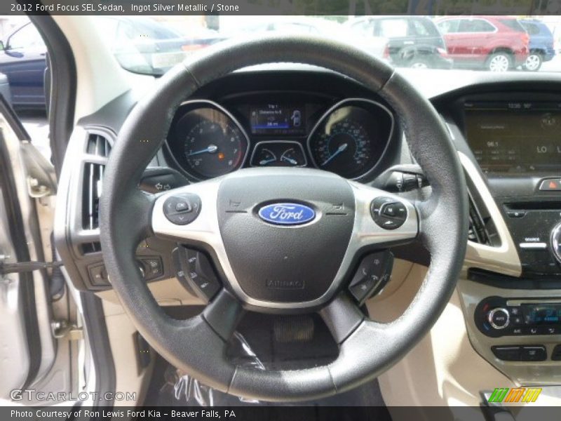 Ingot Silver Metallic / Stone 2012 Ford Focus SEL Sedan