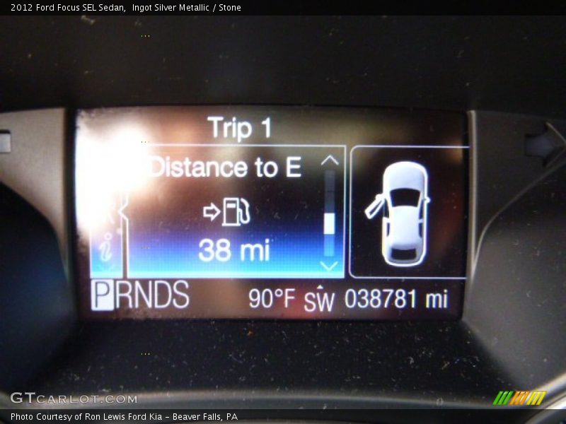 Ingot Silver Metallic / Stone 2012 Ford Focus SEL Sedan