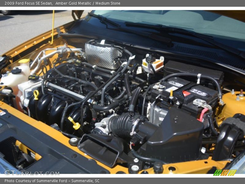 Amber Gold Metallic / Medium Stone 2009 Ford Focus SE Sedan