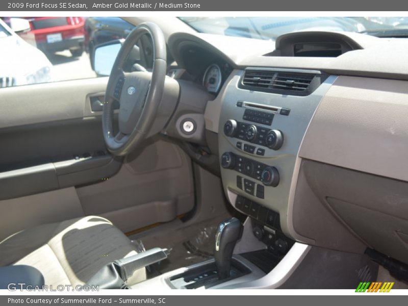 Amber Gold Metallic / Medium Stone 2009 Ford Focus SE Sedan
